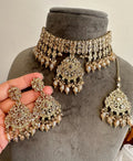 Gold polki choker necklace and earrings set with coloured stones, made in India